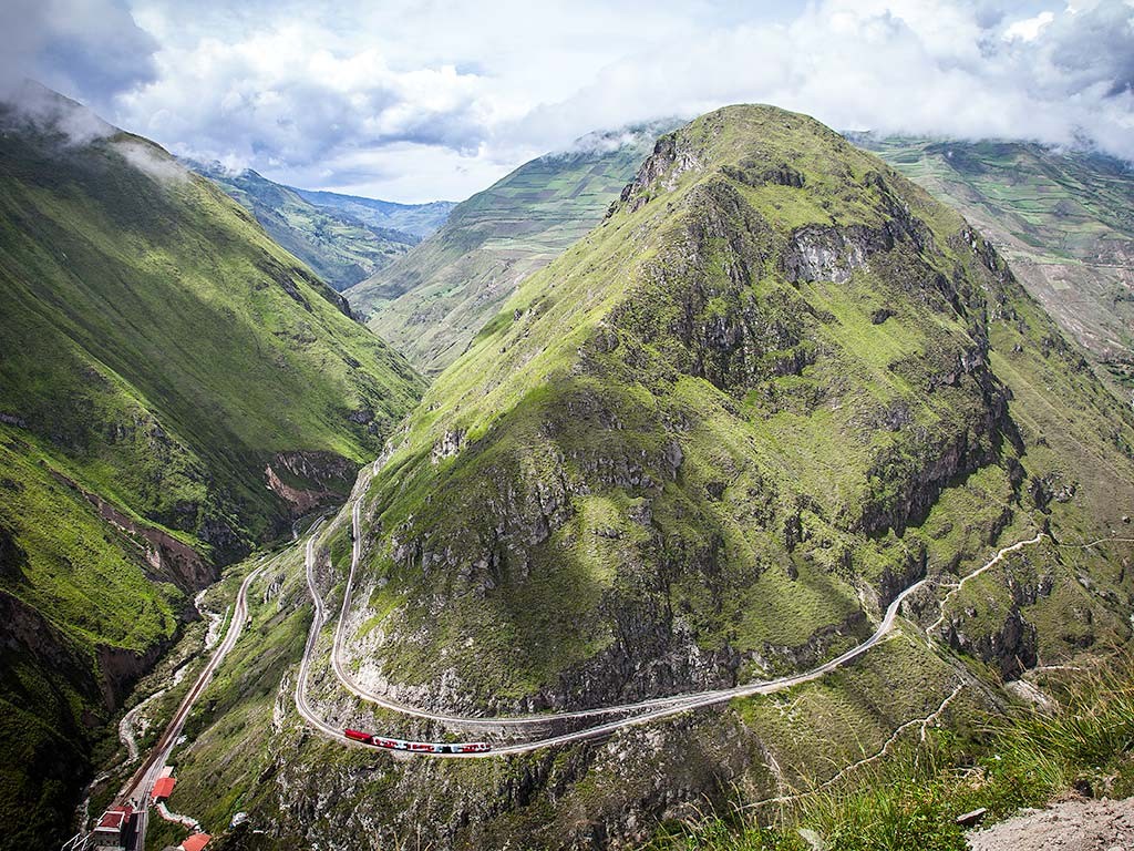 Train passing through the Devil’s Nose cliffs in Ecuador