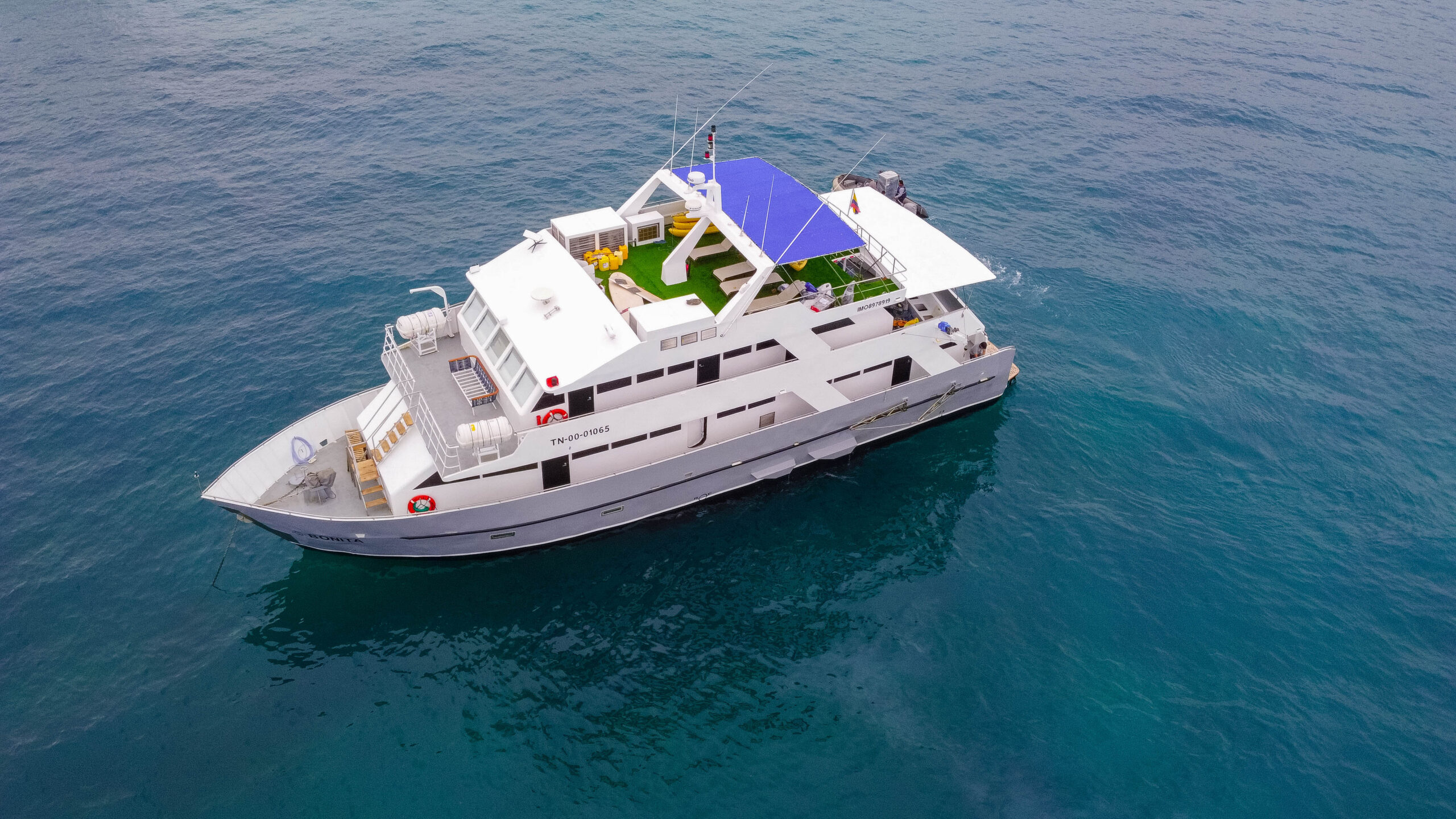 Bonita Cruise from the air – Galapagos Aerial view of the Bonita cruise ship sailing in the Galapagos Islands