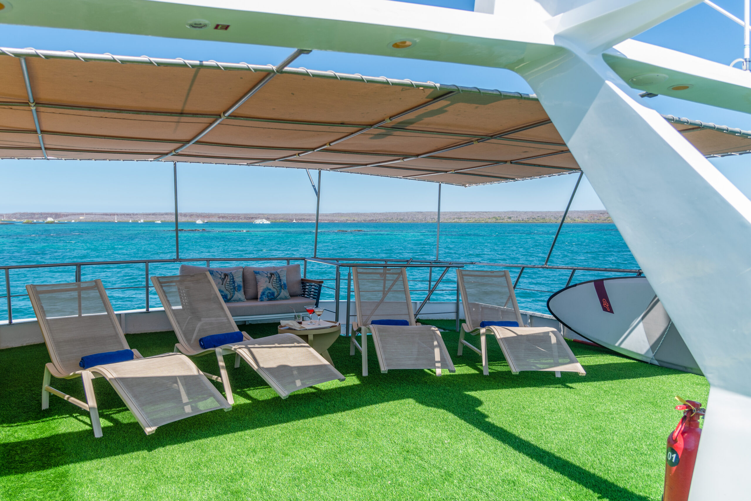 Sundeck – Bonita Cruise Sundeck area on the Bonita cruise with loungers and ocean views