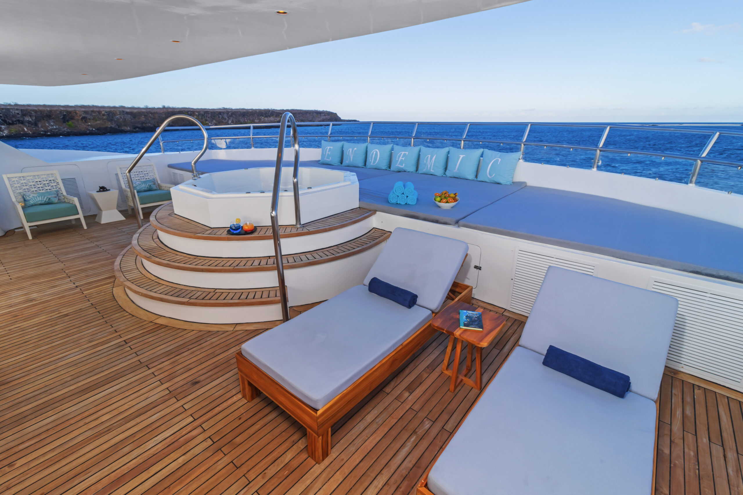 Sundeck - Endemic Luxury Cruise Sundeck with loungers and shaded area on the Endemic catamaran