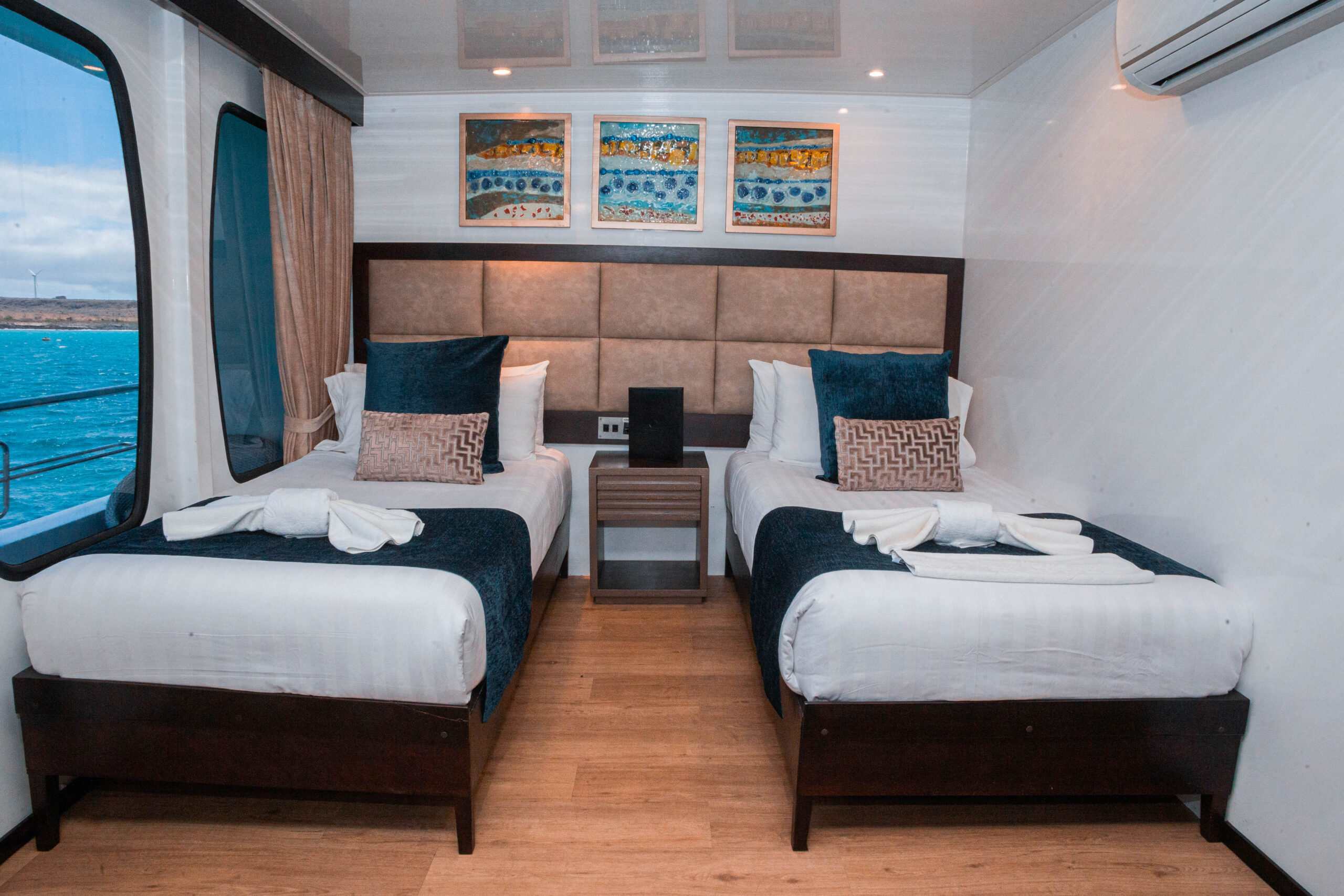 Alya Twin Cabin Modern twin cabin with wooden accents aboard the Alya