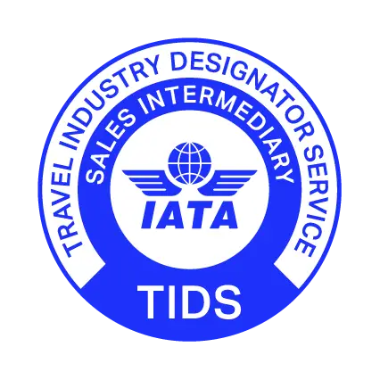 Circular IATA seal for Travel Industry Designator Service (TIDS) featuring globe with wings and bold IATA letters.
